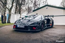 The Black Mclaren Senna With Red Accents At Goodwood Mclaren Luxury Cars Senna