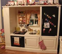 Diy Play Kitchen From An Entertainment Center Diy Play Kitchen Play Kitchen Kids Play Kitchen