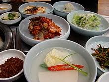 From korean kimch'i, hypercorrection of cimch'i, earlier timchoy, from middle chinese, equivalent to chinese chén steeped. Kimchi Wikipedia