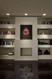 Custom modern bookcase designs around fireplace. Creative Built In Apartment Interior Home Home Remodeling