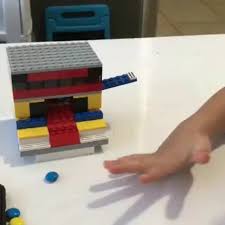 Made a pocket (easy to keep in your bag) size lego candy dispenser for my kids. Tutorial How To Make Basic Lego Candy Dispenser Video Lego Candy Dispenser Lego Candy Candy Dispenser
