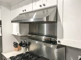 Spritz sections of the floor and wipe clean with the rag. How Do You Clean A Greasy Range Hood 5 Simple Steps