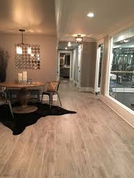 Even when the weather is dry, basement flooring might leach residual moisture in the form of vapor vinyl flooring, also known as resilient flooring, ranks with concrete and ceramic tile as one of the better basement flooring options. Basement Flooring Ideas Flooring Thomas Tile Faux Wood Grey Washed Porcelain Tiles Basement Flooring Options House Flooring Home Decor
