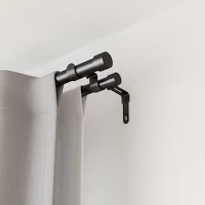 Place your shower liner facing in towards the shower walls and the decorative curtain on the outside facing the rest of the room. Cappa Double Curtain Rod Shop Double Curtain Rods Umbra Canada