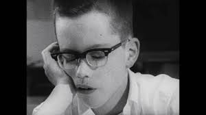 Años 1950: El niño lee en: video de stock (totalmente libre de regalías)  1104844255