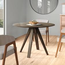 It is constructed from solid maple, which is not only incredibly strong but also offers stunning natural beauty. Corrigan Studio Cullinan Solid Wood Dining Table Reviews Wayfair