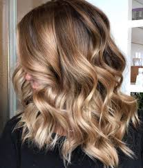 The light caramel highlights cover the sides more and towards the end of the length and follows a free hand pattern instead of any strict shape. 50 Light Brown Hair Color Ideas With Highlights And Lowlights
