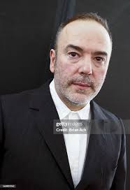 Designer John Patrick poses for a portrait at the Organic By John... News  Photo