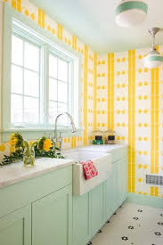 Vintage Yellow And Mint Green Laundry Room Features White And Black Vintage Hex Floor Tiles Compleme Laundry Room Decor Retro Laundry Room Yellow Laundry Rooms