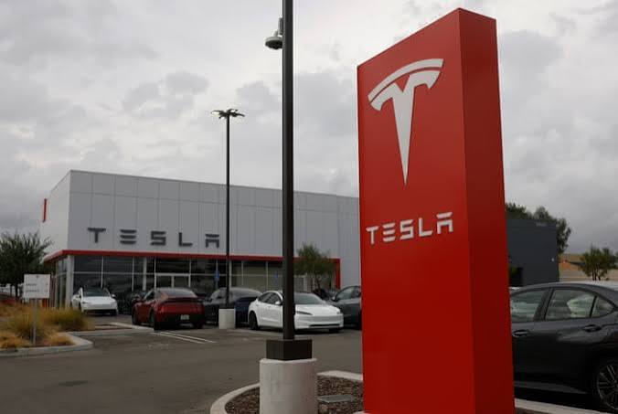 Tesla beats earnings projections after Musk floats SpaceX merger plan | Tesla | The Guardian