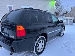Image result for Black 2009 Envoy