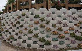 It S A Vertical Planter It S A Succulent Tapestry It S A Retaining Wall Vertical Planter Plant Wall Garden Wall