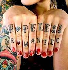 According to whitesmoke.com, a hopeless romantic is an expression describing a person who has romantic notions about life. Hopeless Romantic Tattoos Inked Magazine Romantic Tattoo Finger Tattoos Knuckle Tattoos