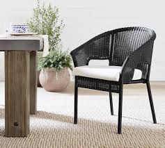 The metal is beautifully rusted with hints of green and white paint. Palmetto Indoor Outdoor All Weather Wicker Stackable Dining Armchair Black Pottery Barn
