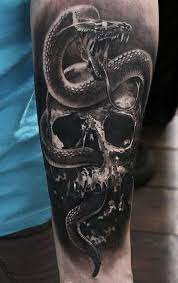 We'll also give you some ideas on the best. Realistic Looking Detailed Arm Tattoo Of Human Skull With Evil Snake Snake Tattoo Design Evil Skull Tattoo Sleeve Tattoos