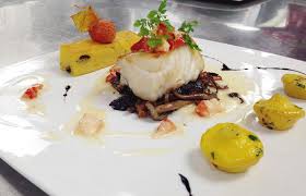 The Best Warn Weather Entree Is Served We Feature A Tender Flaky Sea Bass Steak Atop Wild Mushroom Fricassee With Black Mushroom Fricassee Food Food Plating
