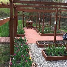 Deer Proof Raised Bed Vegetable Garden With Trellis Entrance Way Vegetable Garden Raised Beds Garden Beds Building A Raised Garden