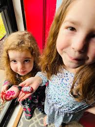 Are there more hidden ladybug rocks in the neighborhood?