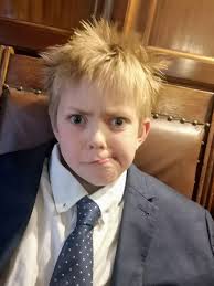 Boris Johnson 'lookalike', 9, writes virus rap as blond locks grow out in  quarantine