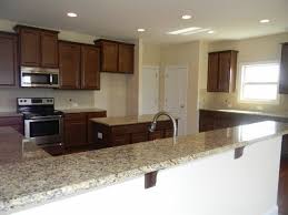 Katherine Timberlake Andover Nutmeg Cabinets New Venetian Gold Granite Board 1 Kitchen Cabinets And Countertops Kitchen Remodel New Venetian Gold Granite