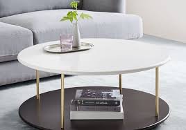 Round shape coffee table and end table for outdoor and indoor. West Elm Fall Line Favorites Sunset Magazine