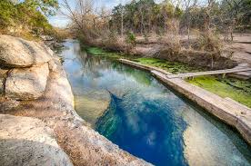 The blue hole of santa rosa appears in the midst of the desert like a great blue gem. The Best Swimming Holes In The Texas Hill Country