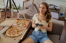 The one with the dozen lasagnas. People Fun Sofa Stock Photos Offset