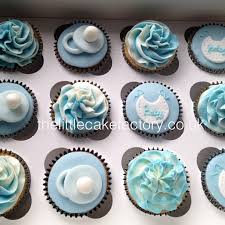 In the end, it will be hard to resist them! Baby Shower Cupcakes Blue Baby Shower Cupcakes Boy Dummy Soother Bib Swirl Vanilla Banana Mummy Bubba A Photo On Flickriver