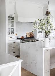 I lean against it because of the angle of the peninsula, i'm not 100% convinced it will look right since it will only be on this one side and it requires a return. One Side Kitchen Waterfall Island Design Ideas