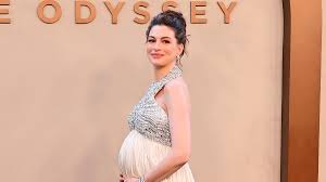 Pregnant Anne Hathaway Cradles Baby Bump in Custom Prada Dress at 'The Odyssey' NYC Premiere