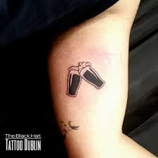 The artist has opted to tattoo in a heart more. Never Without My Guinness What A Nice Tattoo Idea Made In Ireland Dublin Ireland Tattoo Small Irish Tattoos Irish Tattoos