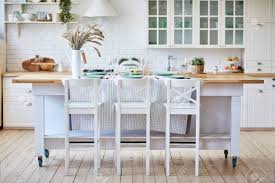 Find the perfect deal for wooden kitchen chairs with free shipping on many items at ebay. Beautiful White Wooden Kitchen With Island Table And Chairs Stock Photo Picture And Royalty Free Image Image 130506387