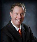 Ken David Elving, Broker