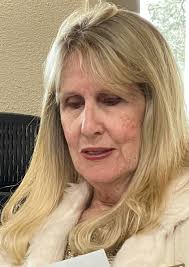 Today at our Christmas celebration Jeanne Fisher lead us off by welcoming  all,then she lead us in singing Christmas carols turned it over to Diane  Dunckle Caliendo for offering then everyone got