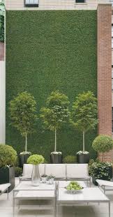 Backyard Landscaping Ideas Cover An Unfinished Wall With Faux Turf Accent Panels Home Depot Backyard Landscaping Vertical Garden Backyard