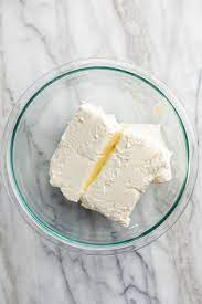 Blocks Of Softened Cream Cheese In A Glass Bowl On A Marble Surface Soften Cream Cheese Cream Cheese Cheese