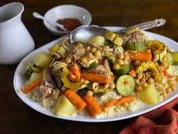 Bring everything to a simmer and then reduce the heat to low, just enough to maintain the simmer. Glorious And Festive Moroccan Ish Couscous With Chicken Lamb Chickpeas And Veg Exuberantly Celebrates Autumn Cooks Without Borders