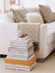 This coffee table rests on thick silver metal legs. 5 Simple Tips For Decorating With Coffee Table Books A Round Up Zdesign At Home
