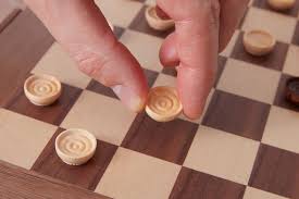 King becomes two pieces for most of the game of checkers, you are moving pieces around the board one at a time. How To Play American Checkers