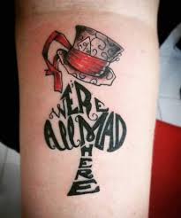 A pug themed birthday cake. 150 Charming Alice In Wonderland Tattoos August2021