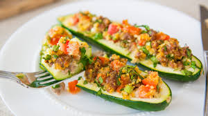 You step away from your garden bed for one minute (or a weekend) and come back to find a monster zucchini hiding in the greenery. Italian Sausage Stuffed Zucchini Boats Recipe Veggie Side Dishes Youtube