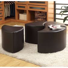 Tucked under this solid acacia wood cocktail table are four storage ottomans that are perfect for pulling up a seat or kicking up your feet. Strand 4 Piece Cocktail Ottoman With Casters Homelegance Furniturepick