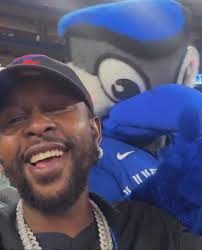Popcaan with Ace the Toronto Blue Jays Mascot