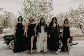 Trendy Bride Tribe Black Bridesmaid Dresses Leather Jackets Preserve Studio Edgy Wedding Trendy Bride Black Bridesmaid Dresses