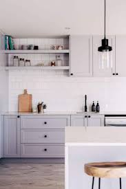 Light grey kitchen cabinets with gold hardware. 40 Romantic And Welcoming Grey Kitchens For Your Home