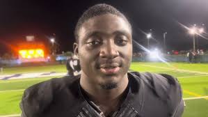 Miami Central Anjuan “Ace” Coleman with the amazing grab for a TD