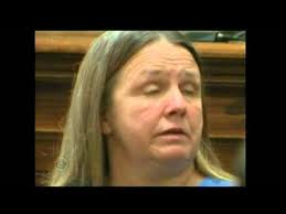 Accused Killer Takes Stand in Her Own Defense