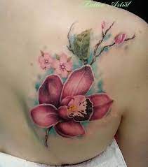 Girly Girl Orchid Tattoo Design The Color Combo The Art And The Placement Simply Perfect Orchid Tattoo Orchid Tattoo Meaning Orchid Flower Tattoos