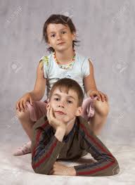 Sister Sit At Brother Stock Photo, Picture and Royalty Free Image. Image  5867998.