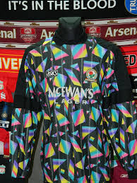 Competed in the fa premier league (known as the fa carling premiership for sponsorship reasons). Blackburn Rovers Keeper Voetbalshirt 1994 1995 Sponsored By Mcewan S Lager